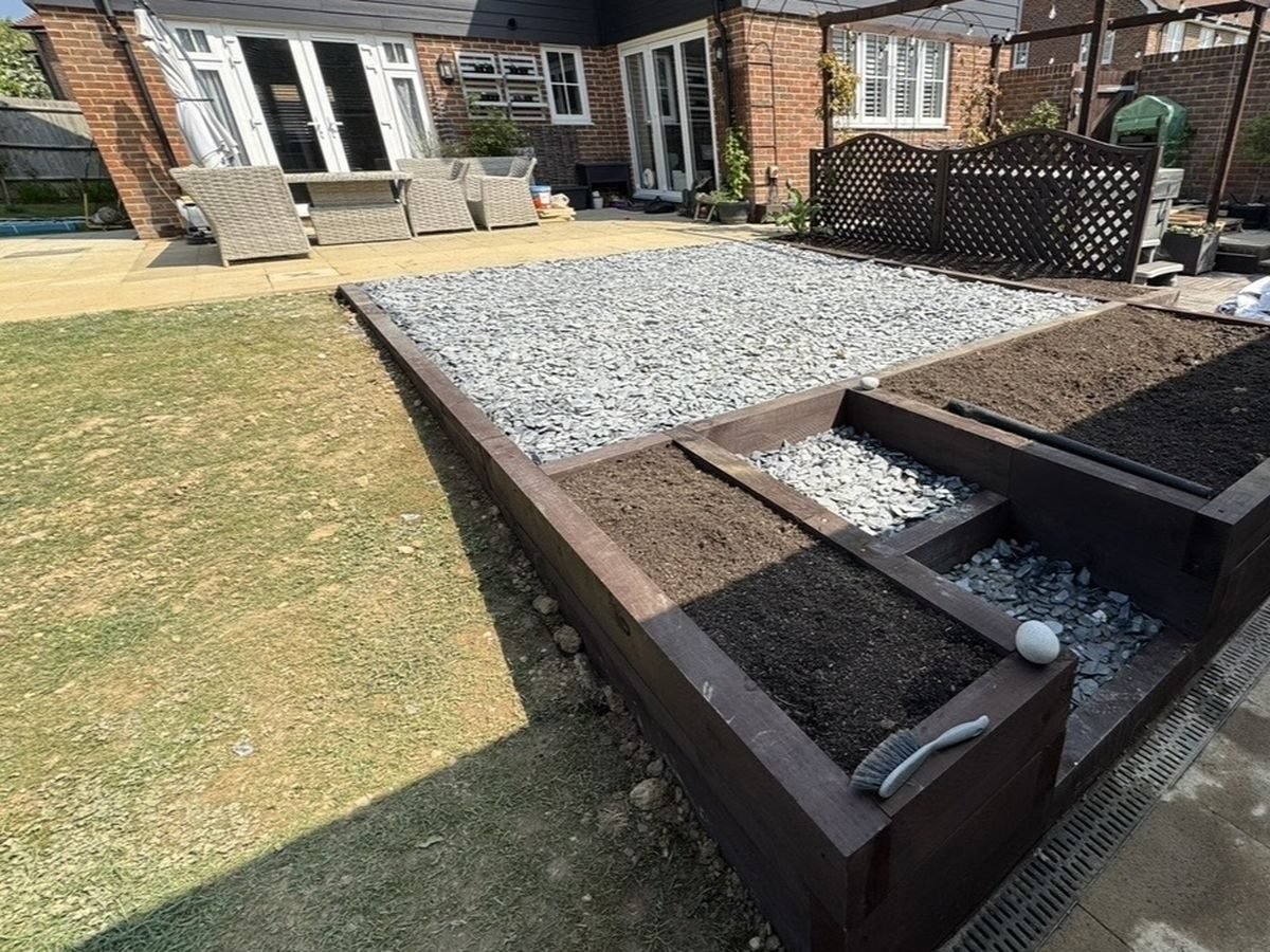 Landscaped garden with lawn and planting